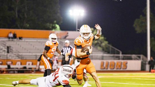 Lions Tame Red Devils 50-0