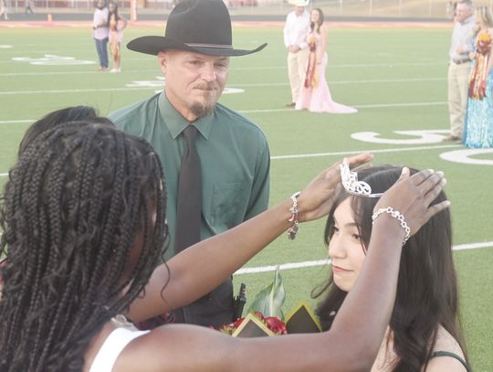 Senior Angelina Cobb is crowned the 2024 Fairfield High School Homecoming Queen by 2023 FHS Homecoming Queen Charlee Brackens, as Cobb’s father, Paul, looks on prior to the football game against Brownsboro on Friday night, Sept. 13. Photo by Mitchell Pate/Fairfield Recorder