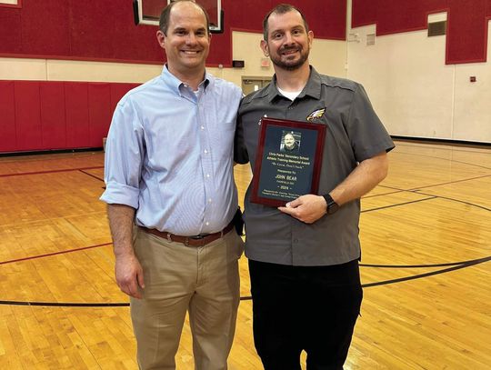 Fairfield ISD Athletic Trainer John Bear receives the 2024 Chris Parks’ Secondary School Athletic Training Memorial Award from CTATS President Jody Moore. Courtesy Photo