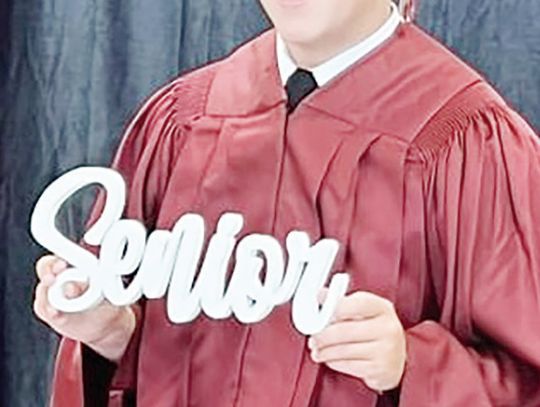 Connor Petty, a senior at Fairfield High School, takes his senior cap and gown pictures at Fairfield High School on Thursday, Aug. 1. Connor has attended FISD since first grade. He is the son of Tommy and Rachel Petty.