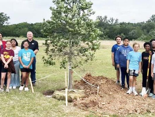 Calpine Donates Tree to FIS for Earth Day