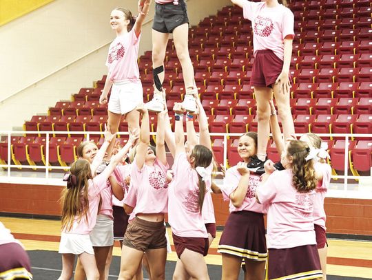 Youngsters perform during a pep rally at the end of cheer camp last week.