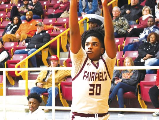 Manny Brown shoots a three-pointer for the Eagles on Friday night against the Panthers. Photo by Mitchell Pate/Fairfield Recorder