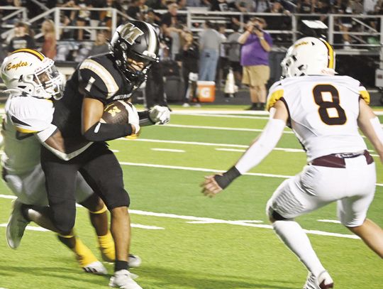Davonte Alexander tackles a McGregor ball carrier on Friday night in the Eagles 69-40 win over the Bulldogs.