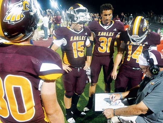 Fairfield Coach Kevin Childers coaches some players during the game against Mexia on Friday night. Photo by Mitchell Pate/Fairfield Recorder