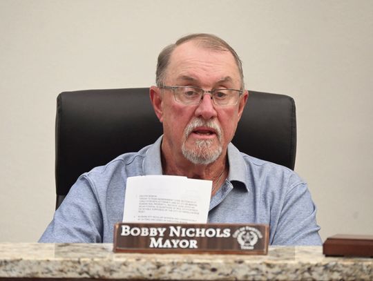 Fairfield Mayor Bobby Nichols gives his report to the council members during the Tuesday, April 8, Fairfield City Council meeting. Photo by Mitchell Pate/Recorder-Chronicle
