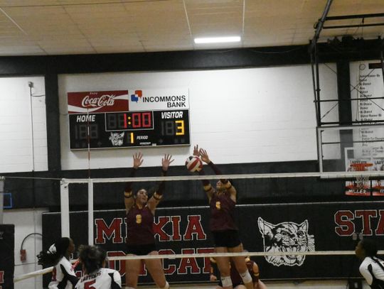 Blayke Brackens (6) gets a block at the net in Fairfield's road win over Mexia Tuesday night.