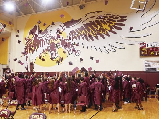 The Fairfield High School Class of 2024 toss their graduation caps into the air at the conclusion of commencement exercises on Friday night, May 24. Photo by Mitchell Pate/Fairfield Recorder