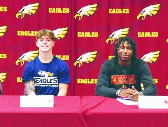 Four FHS Athletes Sign to Continue Football Career