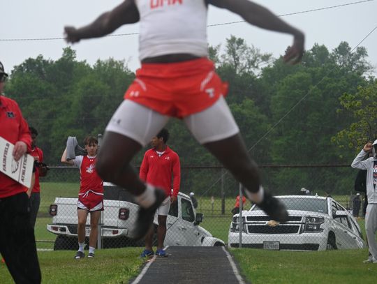 J’Kybryen Harris competes in the long jump competition. He won the gold in the triple jump contest with a jump of 45’ 11½” to advance to Regionals. Photo by Mitchell Pate/Recorder-Chronicle 