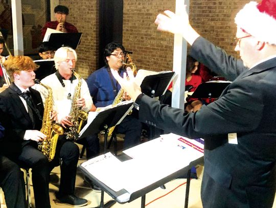Fairfield High School Band Director Russell Holland directs his jazz band during the Holiday in the Halls event at Fairfield High School last week. Photo by Mitchell Pate/Fairfield Recorder