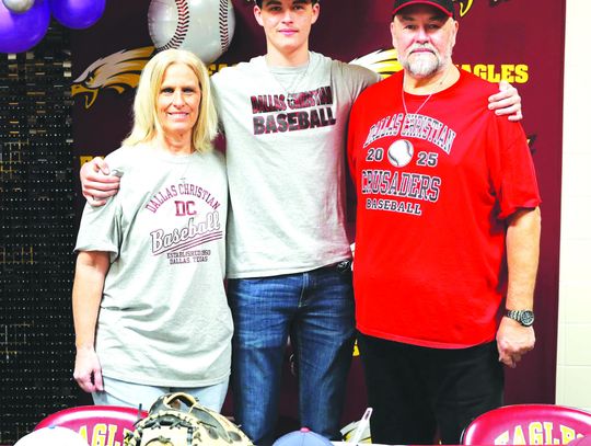 Justin Johnson is pictured with his parents, Jimmy and Kristi Johnson, on his signing day at Fairfield High School on Friday, Feb. 7. Courtesy Photo
