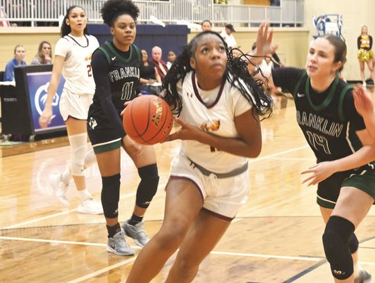 Jaci Abram drives to the goal and goes up for a basket for Fairfield in the Bi-District Championship on Monday night against Franklin. Photo by Mitchell Pate/Fairfield Recorder