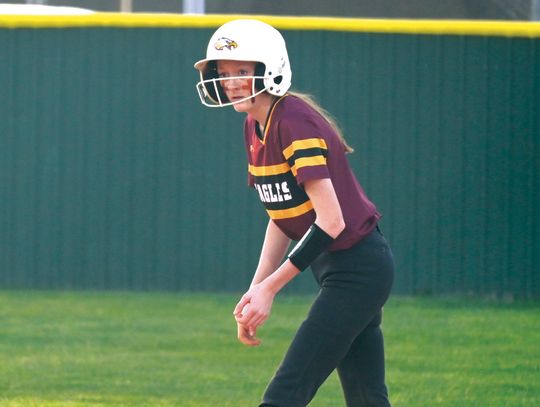 ABOVE: Evelyn Futz is down and ready for the ball to come her way at third base. Photos by Mitchell Pate/Fairfield Recorder