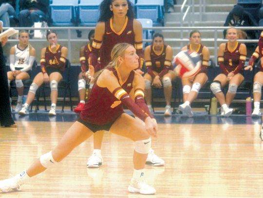 Addison Posey gets down low during a dig attempt for Fairfield. Photo by Mitchell Pate/Fairfield Recorder