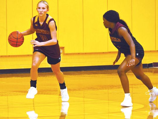 KK Williams brings the ball down the court during practice as KeKe Alexander guards her. Fairfield started district play against Teague on Tuesday night. Photo by Mitchell Pate/Fairfield Recorder