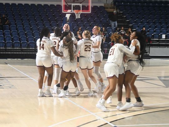 Lady Eagle celebrate.
