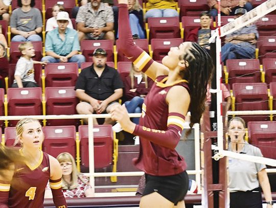 Blayke Brackens hits the ball backwards over the net for the Lady Eagles against China Spring. Photo by Mitchell Pate/Fairfield Recorder