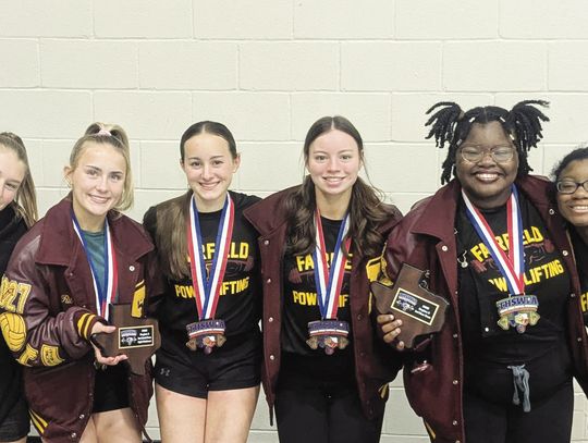 Bry Willis, Taylor Solis, Riley Stone, Auren Adams, MacKenzie Allen, Callie Morgan, Aaryn Morgan, and RaeAnn Rossisky take third place at the Regional Powerlifting Meet at Commerce High School on Saturday, March 1. Courtesy Photo