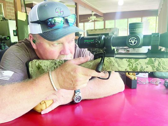 Joe Cunningham with Stealth Vision setting up Luke’s rifle for some long range shooting fun. Photo by Luke Clayton