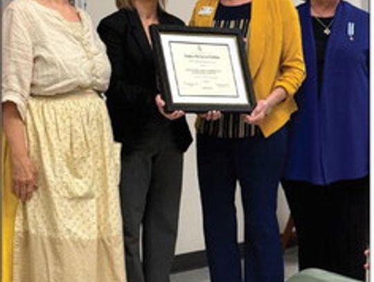Nancy McSwane, Melinda Bonds, Diane Pullin, and Patti Gauntt attend the Jonathan Hardin Chapter, NSDAR meeting in Mexia at Gibbs Memorial Library Wednesday, April 9. The chapter awarded the Moody-Bradley House Foundation/ Fairfield History Club with a National Historic Preservation Recogni...