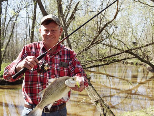 White bass (sandbass) are fun to catch and great eating. Here’s Luke with a bigun landed during the early spring spawn. Catching is fast and furious now on many area lakes. Photo by Jeff Rice