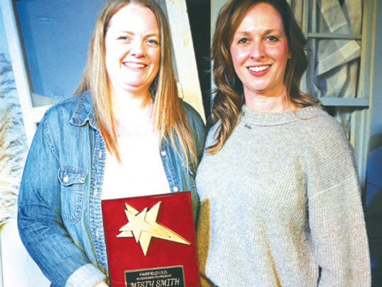 Misty Smith is honored as the Fairfield Elementary School Teacher of the Year by Principal Kelly Walters. Photo by Mitchell Pate/ The Fairfield Recorder
