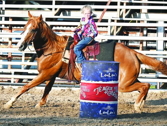 A youngster competes in the barrel racing competition at the Teague 4th of July Youth Rodeo on Saturday night. There were over 300 contestants throughout the youth rodeo. Photo by Mitchell Pate/Fairfield Recorder