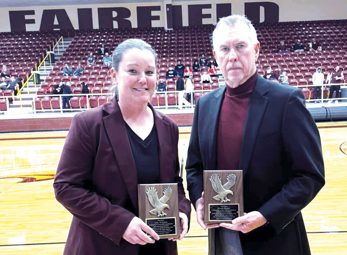 Coach Sally Whitaker and Randy Barger were honored with a plaque on Monday night, Feb. 3, after picking up their 200th win together as coaches. The two have more wins than that in their coaching career, though. The plaques they received read: “In recognition of your 200th basketball win.An...