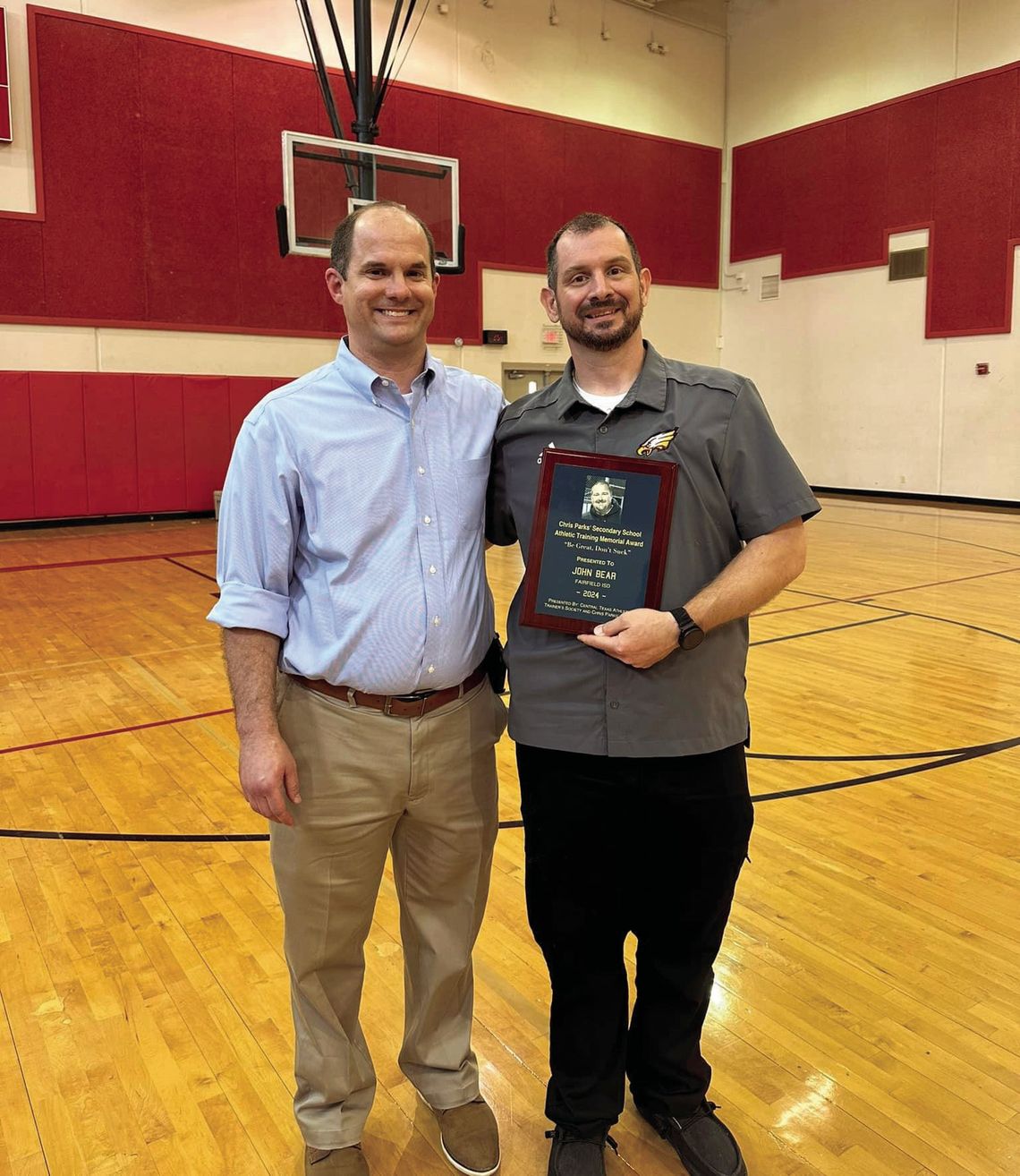 Fairfield ISD Athletic Trainer John Bear receives the 2024 Chris Parks’ Secondary School Athletic Training Memorial Award from CTATS President Jody Moore. Courtesy Photo