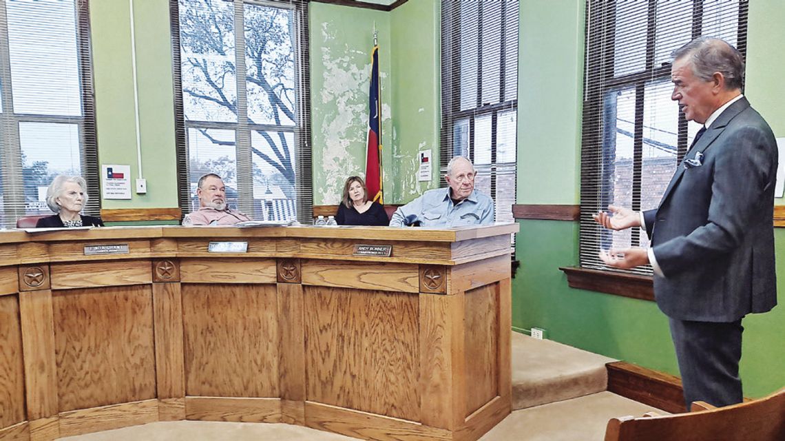 Attorney Blake Beckham explains to Freestone County Commissioners during their Dec. 4 meeting some details of a proposed opioid settlement between drug stores and the County. Photo by Roxanne Thompson/Fairfield Recorder