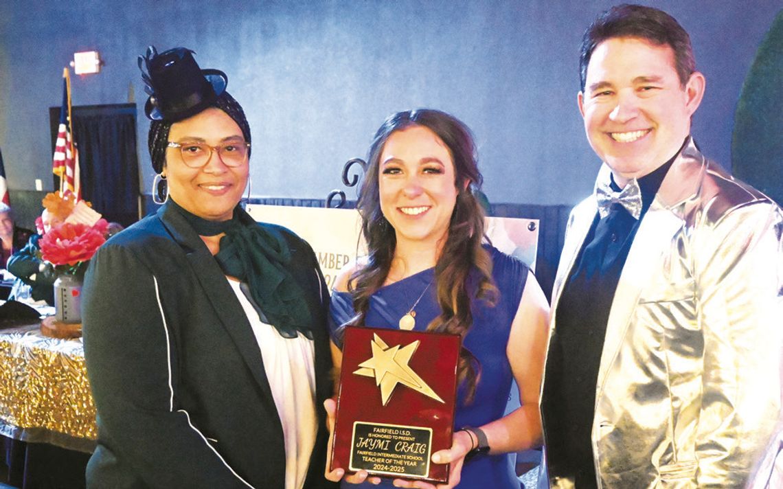 Jaymi Craig receives the Fairfield Intermediate School Teacher of the Year Award from Principal Shetonia Scires and Superintendent Joe Craig. Photo by Mitchell Pate/Fairfield Recorder