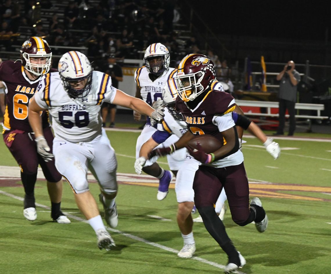 Eagles Ease Past Bison 63-21