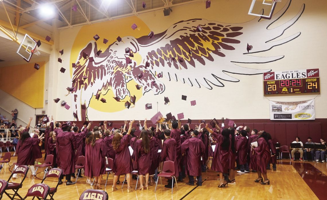 The Fairfield High School Class of 2024 toss their graduation caps into the air at the conclusion of commencement exercises on Friday night, May 24. Photo by Mitchell Pate/Fairfield Recorder