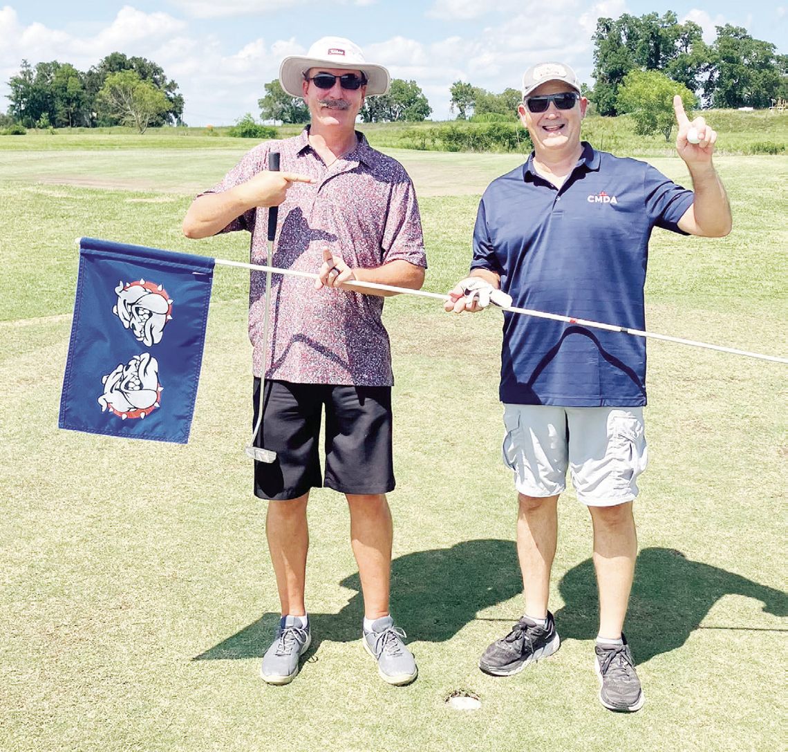 Dr. Darryl White, right, carded a hole-in-one on Tri-County Golf Club at the Vineyards’ No. 4. He used a 9 iron from 128 yards. With White is Scott Carmack. Courtesy Photo