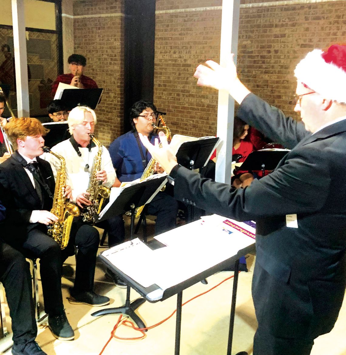 Fairfield High School Band Director Russell Holland directs his jazz band during the Holiday in the Halls event at Fairfield High School last week. Photo by Mitchell Pate/Fairfield Recorder