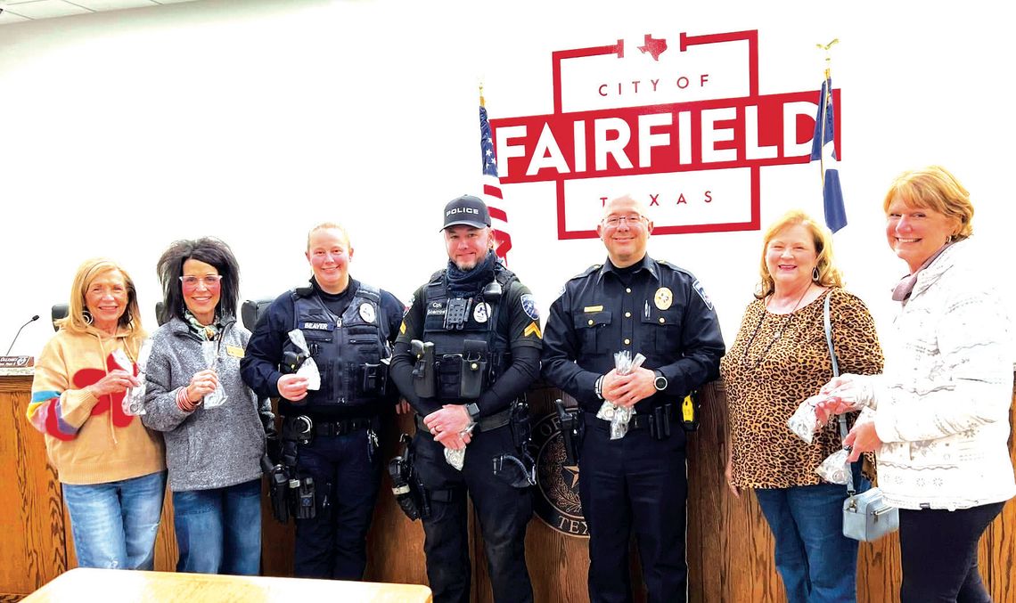 In honor of Law Enforcement Day on Thursday, Jan. 9, the Fairfield History Club representatives presented Saint Michael Police Officer coins to the Fairfield Police Department for all officers. Pictured, from left, are Doris Sneed, Lisa Baggerly, Officer Jennifer Beaver, Cpl. Jared Scarrow...