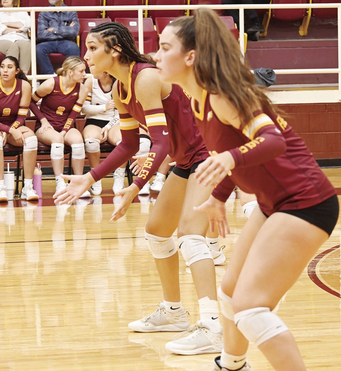 LEFT: Avery Strait and Blayke Brackens get down and ready for the ball to come their way. Photo by Mitchell Pate/ Fairfield Recorder