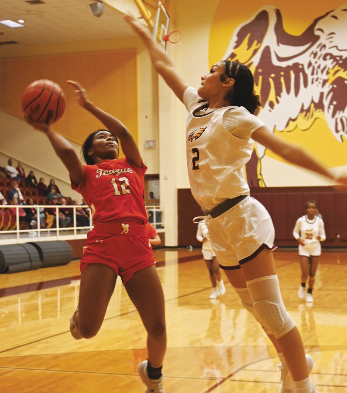 Blayke Brackens jumps to block a shot of Teague’s A’Shaiya Jones. Photo by Mitchell Pate/Fairfield Recorder
