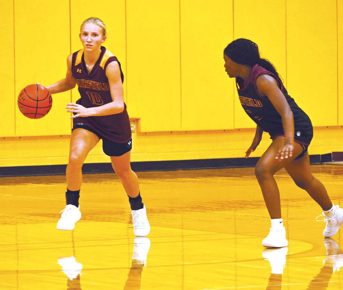 KK Williams brings the ball down the court during practice as KeKe Alexander guards her. Fairfield started district play against Teague on Tuesday night. Photo by Mitchell Pate/Fairfield Recorder