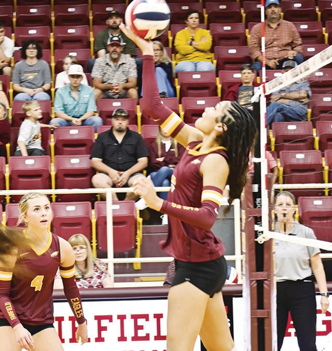 Blayke Brackens hits the ball backwards over the net for the Lady Eagles against China Spring. Photo by Mitchell Pate/Fairfield Recorder