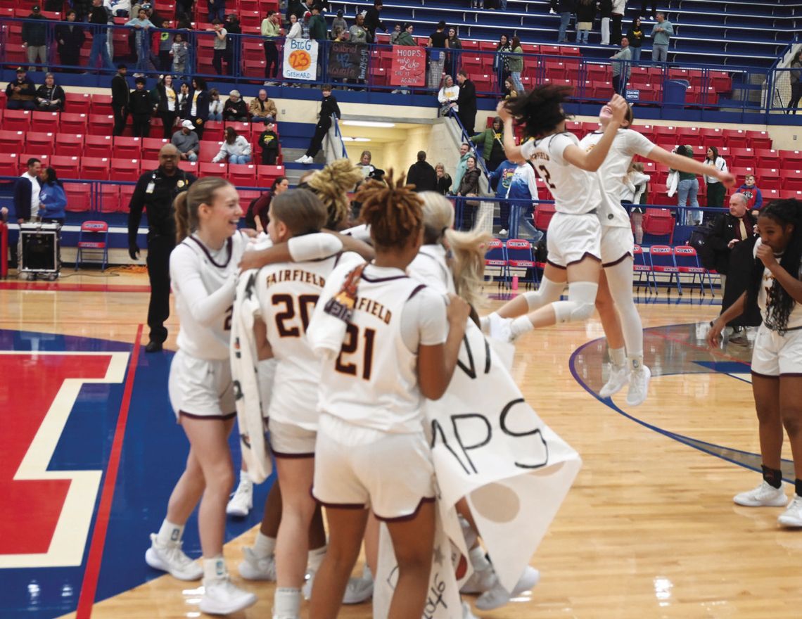 The Fairfield Lady Eagles celebrate their 61-43 victory over the Little River Academy Lady Bees in the Regional Championship. Photo by Mitchell Pate/Fairfield Recorder