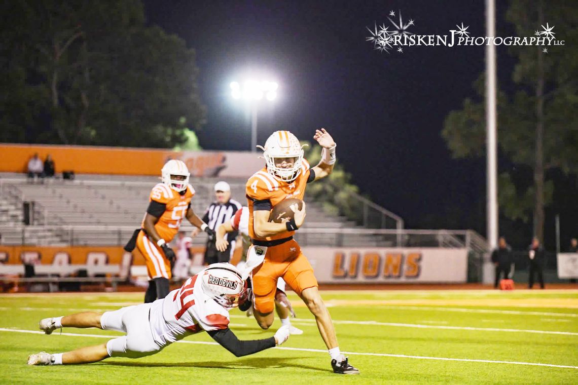 Lions Tame Red Devils 50-0