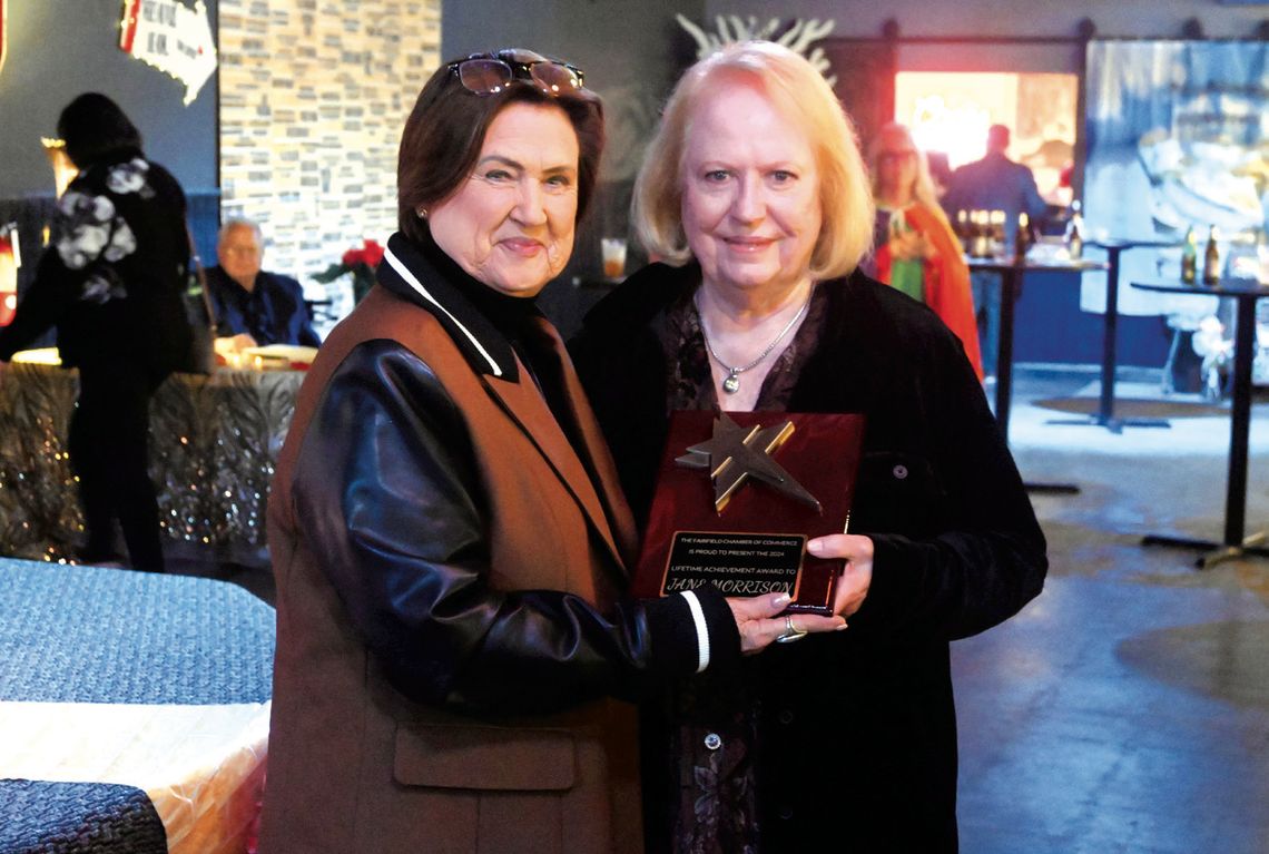 Gail Farish gives the Lifetime Achievement Award to Jane Morrison. Photo by Mitchell Pate/Recorder-Chronicle