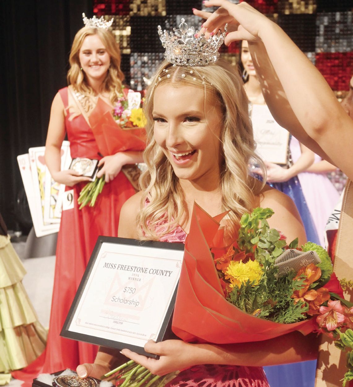 Madison Newhouse is all smiles as she is crowned the 2024 Miss Freestone County. More Pageant photos on Page 8. Photo by Mitchell Pate/Fairfield Recorder