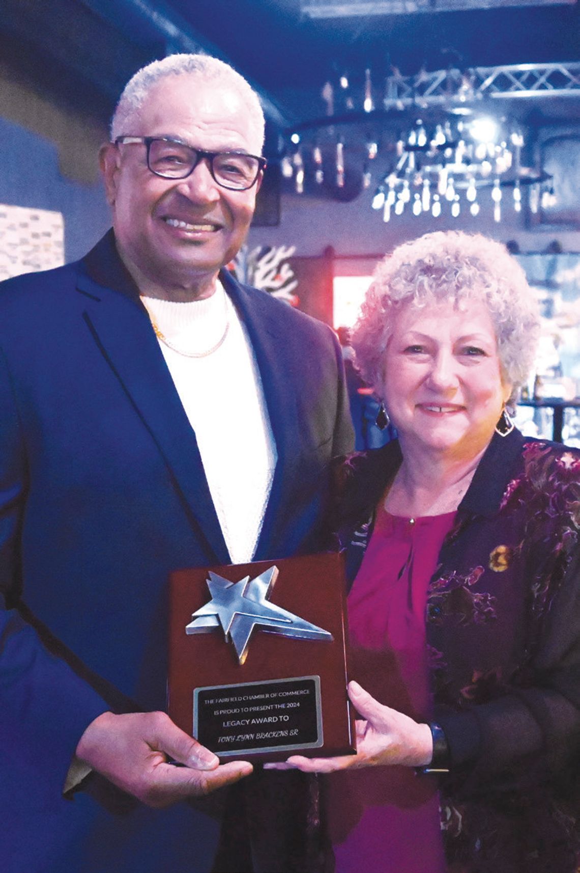 Tony Brackens Sr. receives the Legacy Award from Mary Small. Photo by Mitchell Pate/Fairfield Recorder