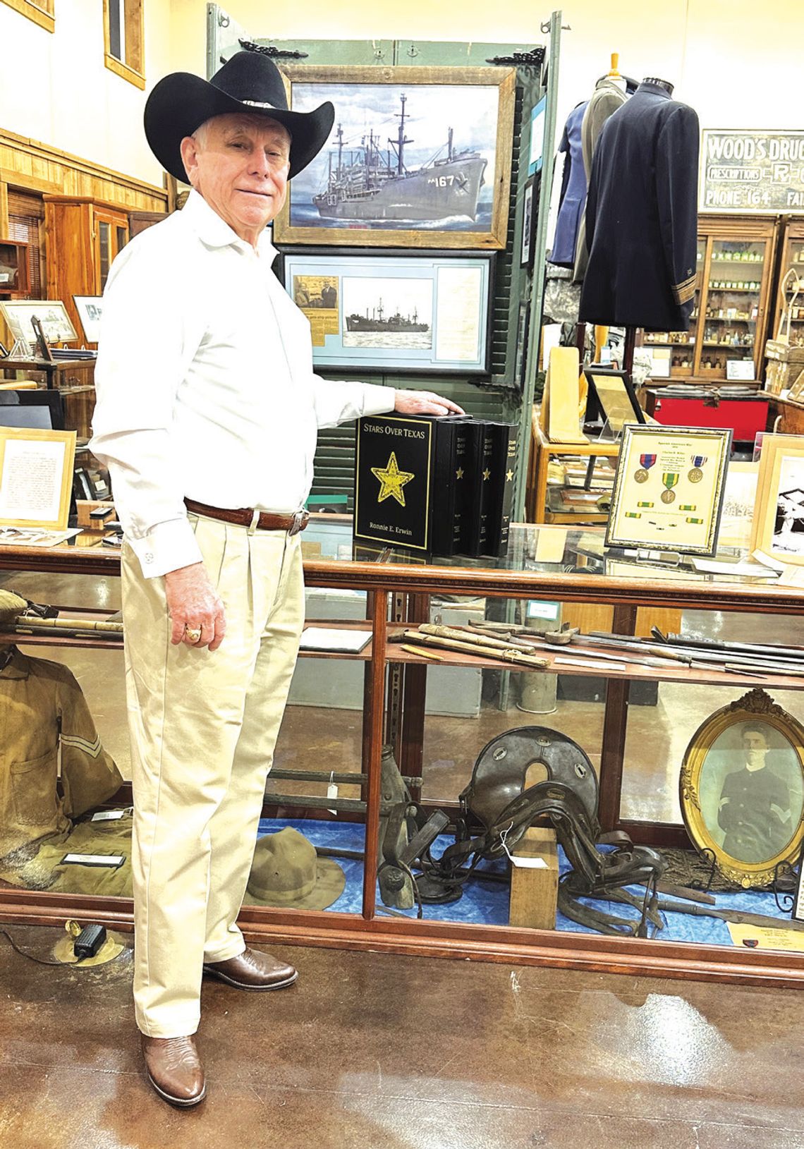 Dr. Ronnie. E. Erwin stands in the Freestone County Historical Museum after donating a copy of his book, “Stars Over Texas.” Contribute photo