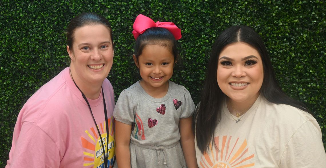 Martinez is all smiles with Kindergarten teachers Kristin Bryd and Vanessa Miller at Kindergarten Registration at Teague Elementary on Thursday evening, April 3. Photo by Mitchell Pate/Recorder-Chronicle