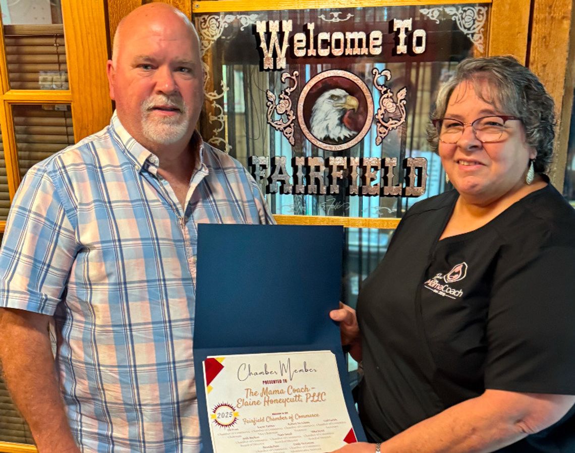 Elaine and Richard Honeycutt show off their certificate from the Fairfield Chamber for The Mama Coach - Elaine Honeycutt, PLLC. Photo by Daryl Allen/Recorder-Chronicle
