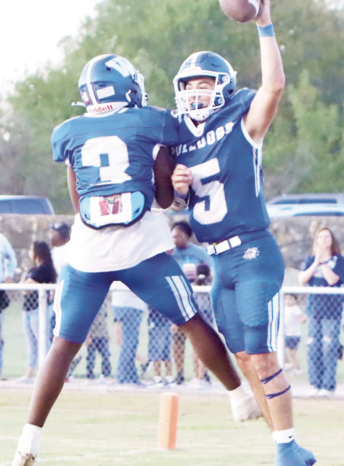 Wortham’s Kymani Johnson (3) and Jon Ross Black celebrate during the club’s 48-20 over rival Frost.